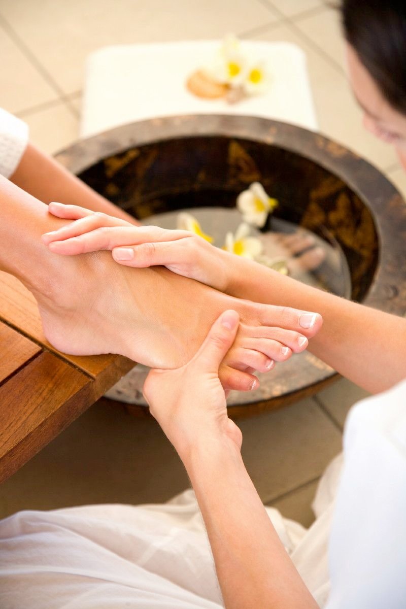 Foot reflexology treatment at a professional wellness spa in Shivamogga,  Karnataka